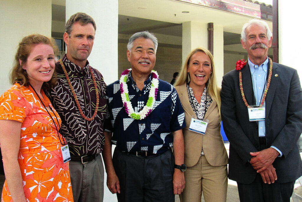 L to R: Abigail Anthony, Rhode Island PUC: James Griffin, Chairman of the Hawaii PUC: Governor David Ige; Jennie Potter, Hawaii PUC; Michael Picker, President of the California PUC.